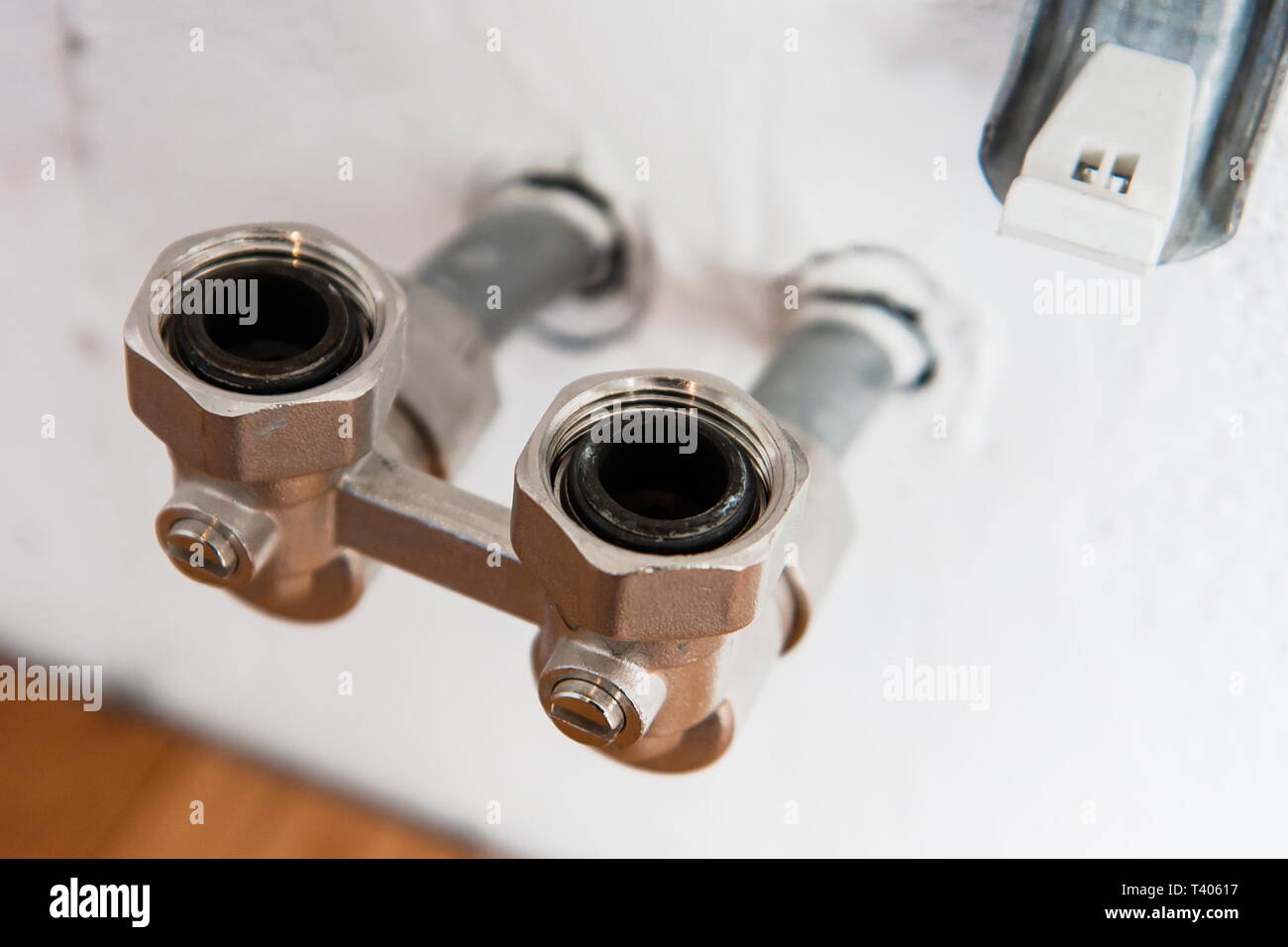 pipes hidden in the wall for radiator mounting system Stock Photo Alamy