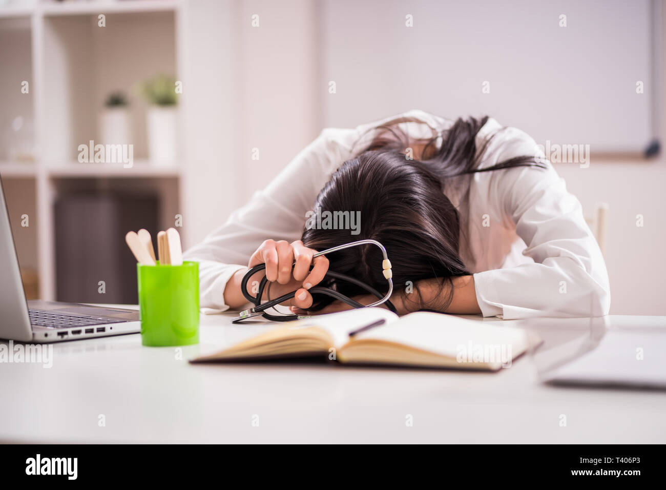 Beautiful female doctor working hi-res stock photography and images - Alamy