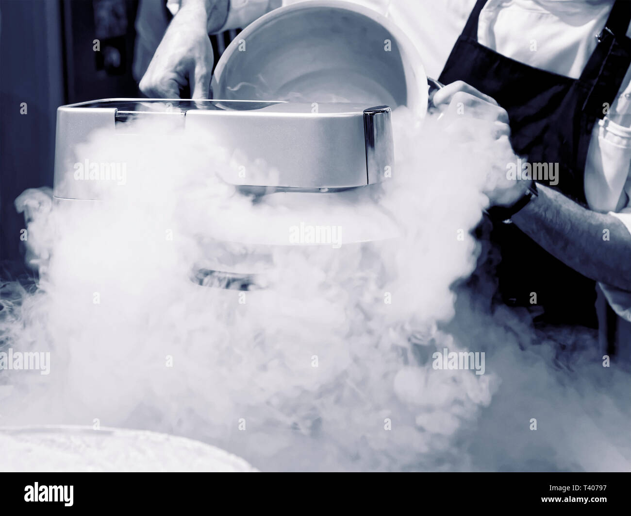 Chef is making ice cream with liquid nitrogen Stock Photo Alamy