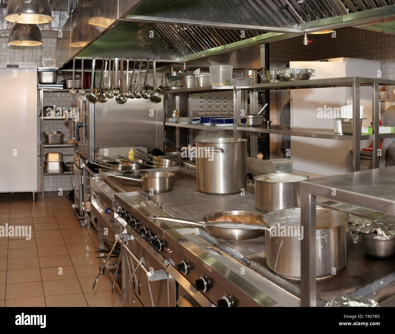 Kitchen of a restaurant shot in operation Stock Photo