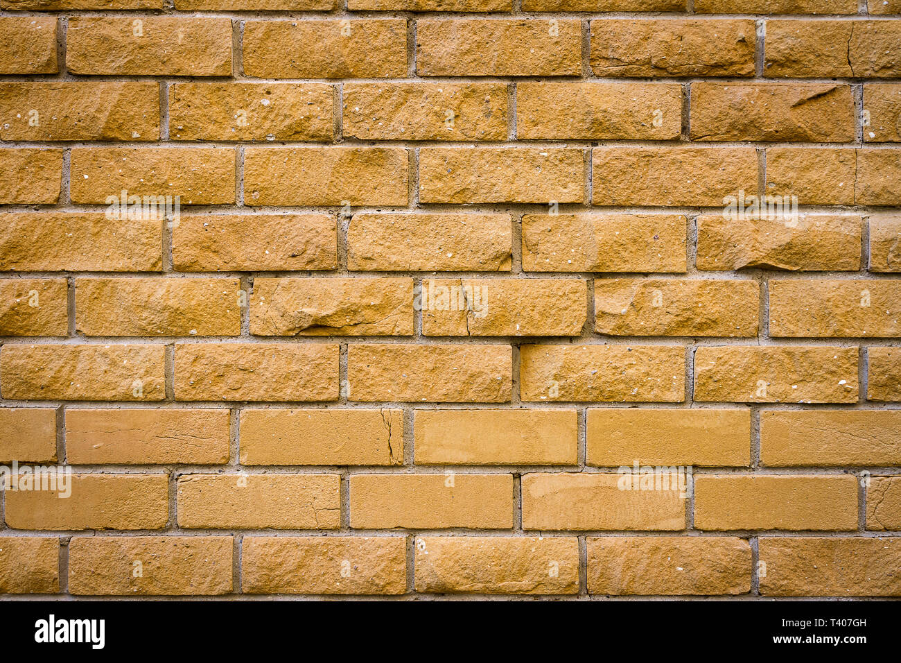 Background of old yellow brick wall texture, abstract horizontal
