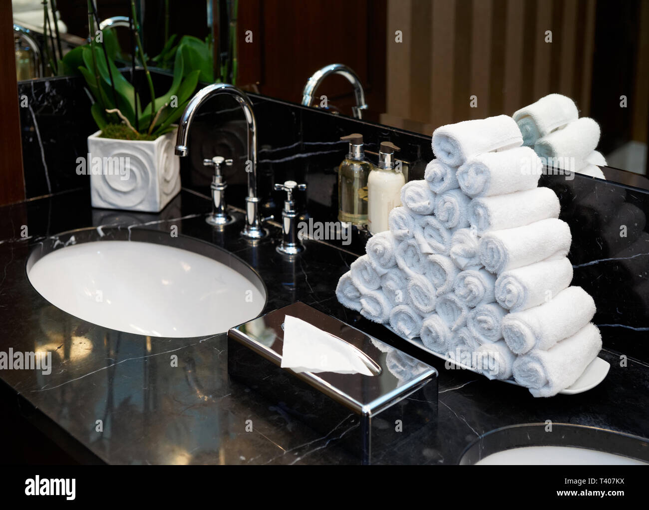 Restroom in hotel or restaurant, focus on towels Stock Photo Alamy
