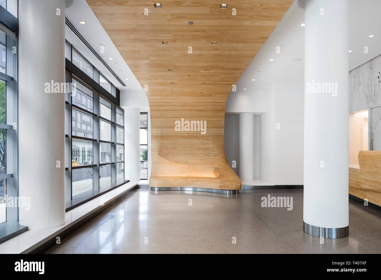 Interior view of the extended canopy sweeping through the lobby. Helena 57 West, New York, United States. Architect: Studio V Architecture, 2018. Stock Photo