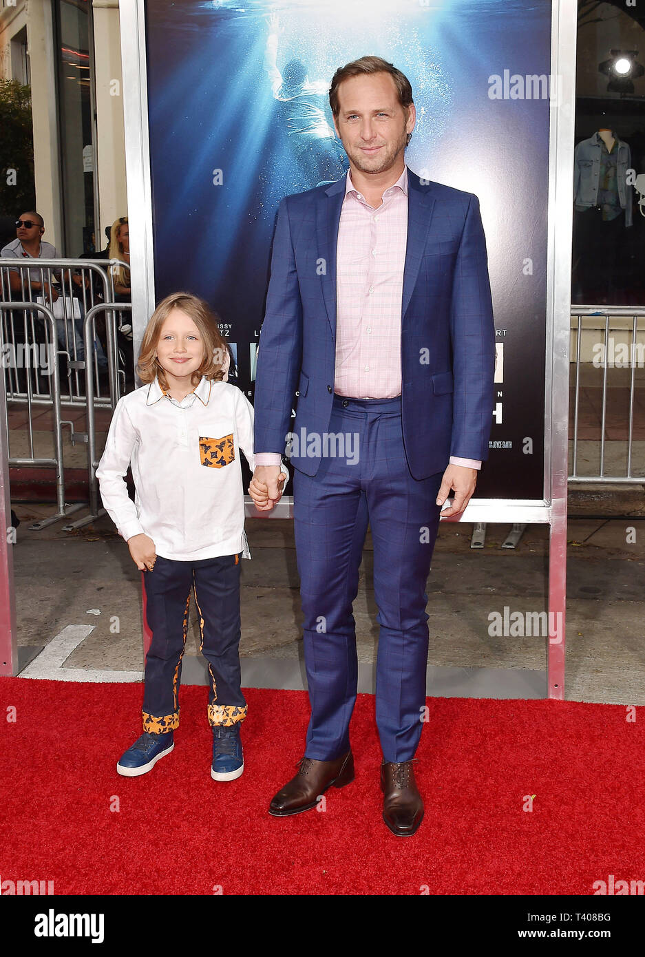 WESTWOOD, CA - APRIL 11: Josh Lucas (R) and Noah Maurer attend the premiere of 20th Century Fox's 'Breakthrough' at Westwood Regency Theater on April 11, 2019 in Los Angeles, California. Stock Photo