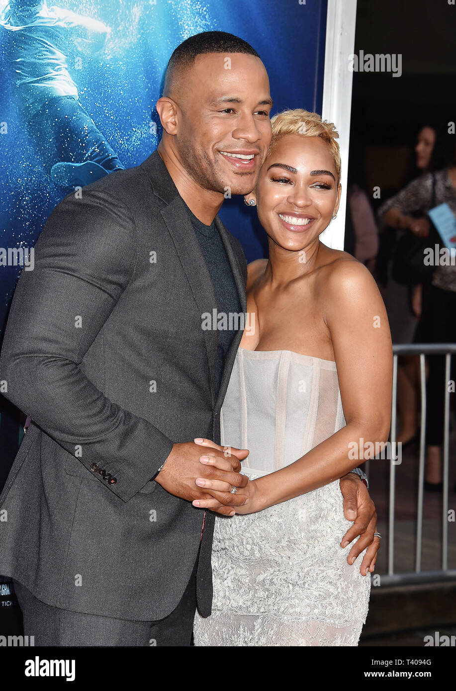 WESTWOOD, CA - APRIL 11: Devon Franklin (L) and Meagan Good attend the