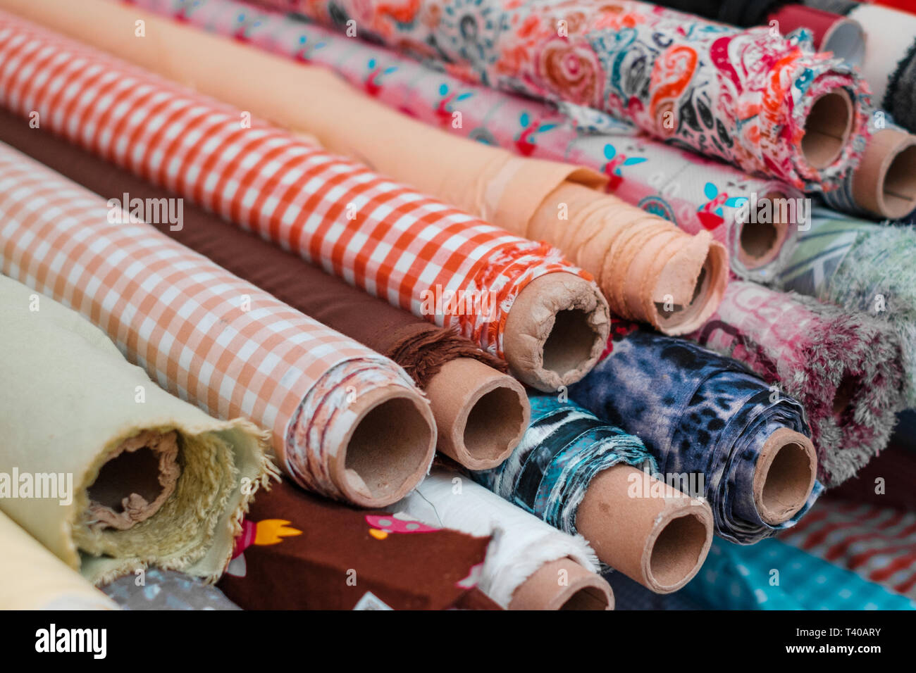 Rolls of  fabrics and textiles. Sewing and fashion industry concept  - Stock Photo