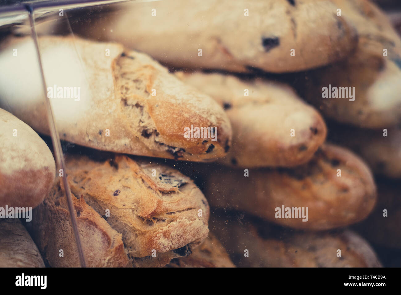 stack of fresh baquette bread closeup for sale at bakery Stock Photo