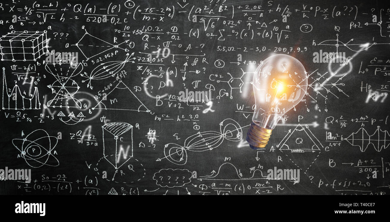 Chalk board with maths sketches and formulas and a light bulb Stock ...