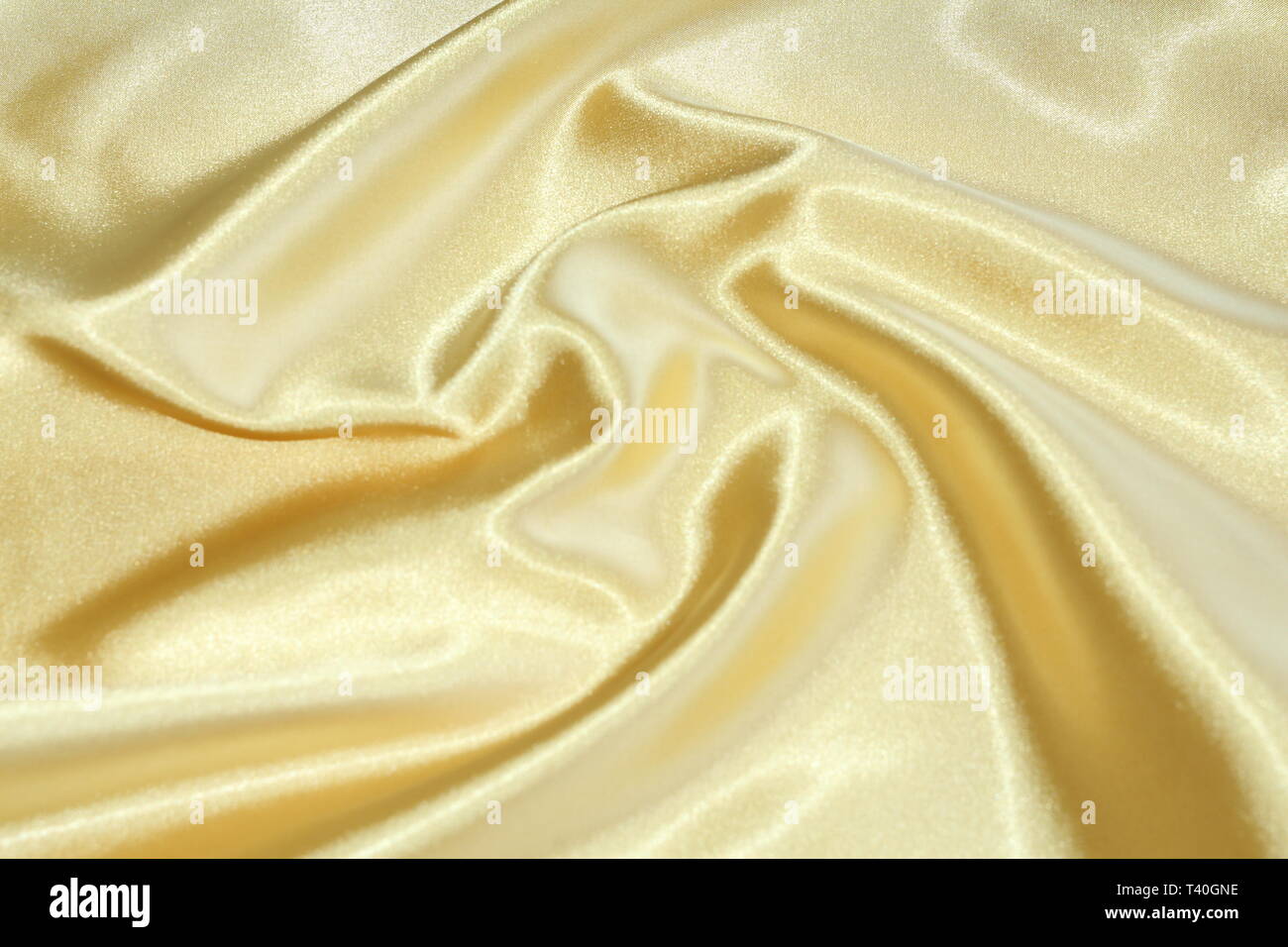 The texture of the yellow material. Bright yellow silk. Golden background  Stock Photo - Alamy