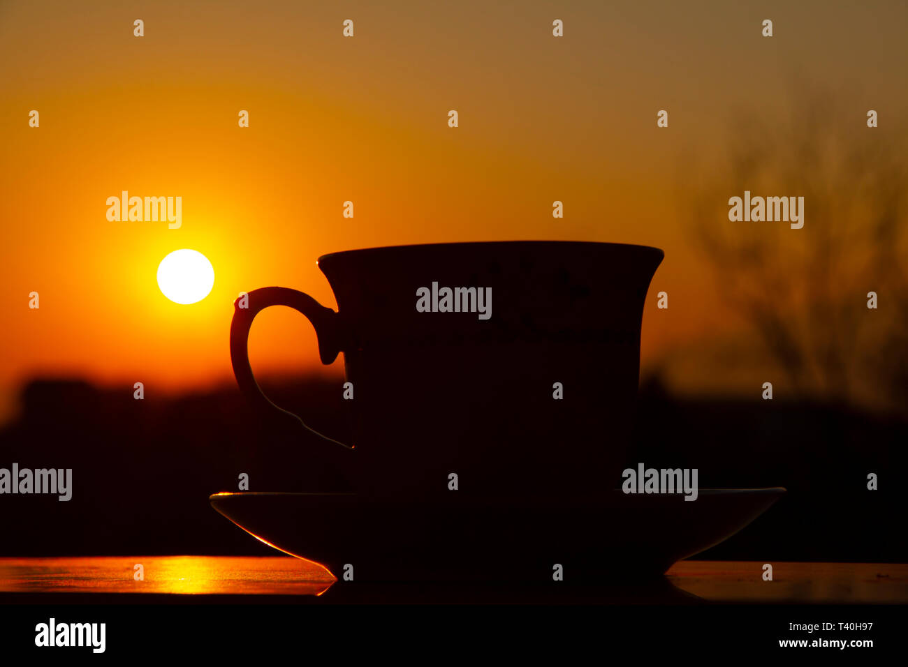 Silhouettes of sunrise morning coffee Stock Photo