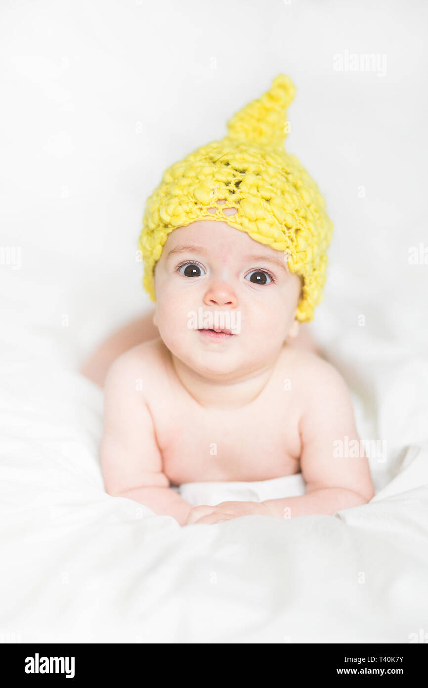 adorable newborn baby on a bed Stock Photo Alamy