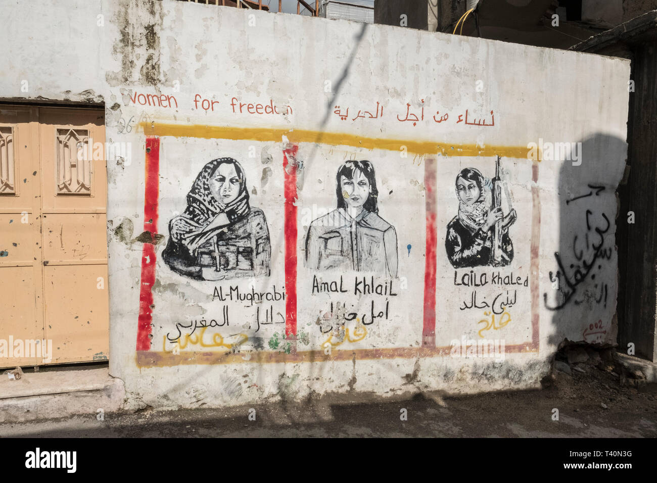 Street art showing Palestinian martyrs who lost their lives fighting what they saw as the Israeli occupation are painted on walls in Aida Camp, Bethlehem, West Bank, Palestine, 11/02/19 Stock Photo
