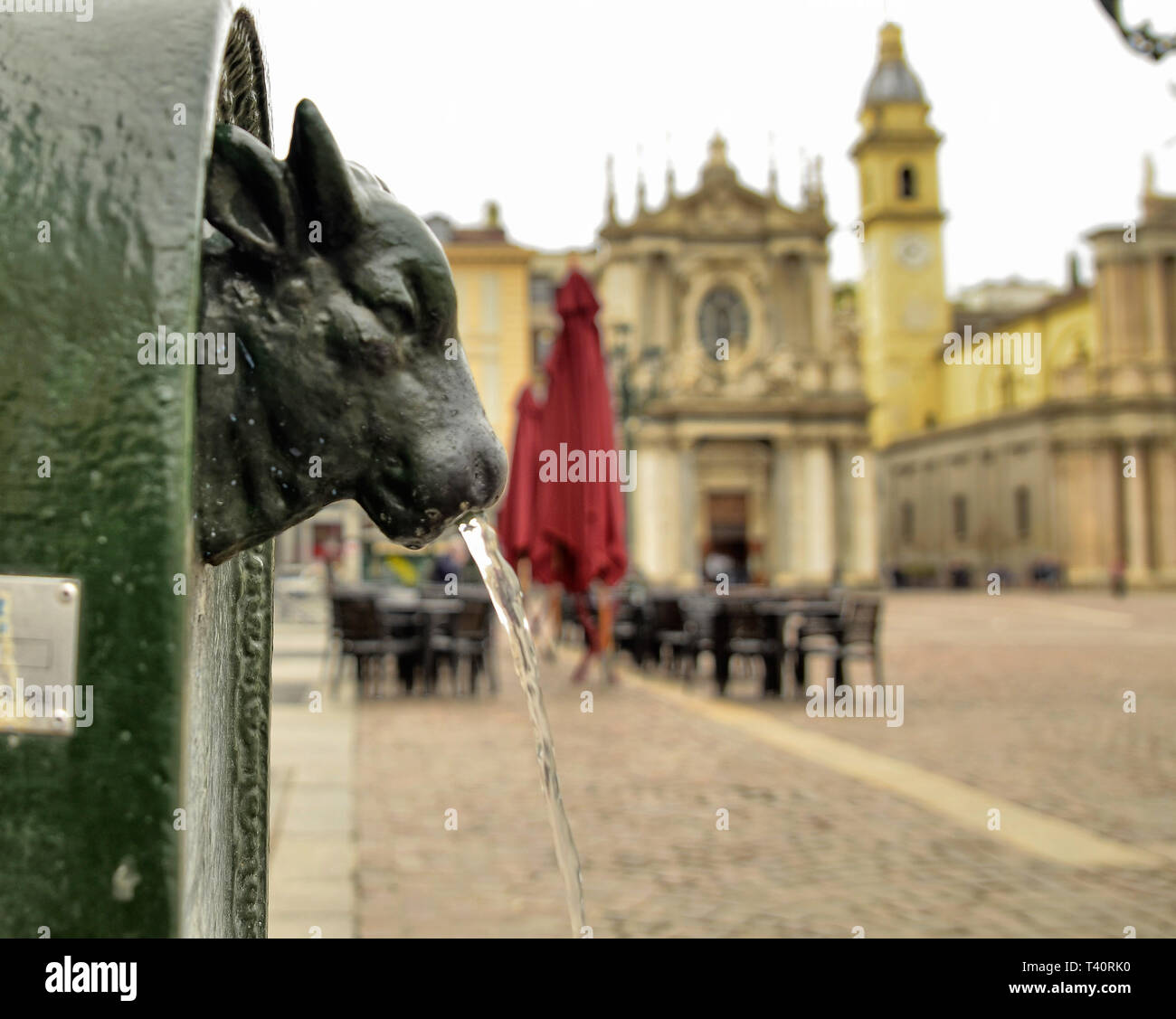 Turin, Piedmont, Italy. April 2019. A look at Piazza San Carlo. On the left in the foreground the fountain with the green bull, called turet, on the r Stock Photo