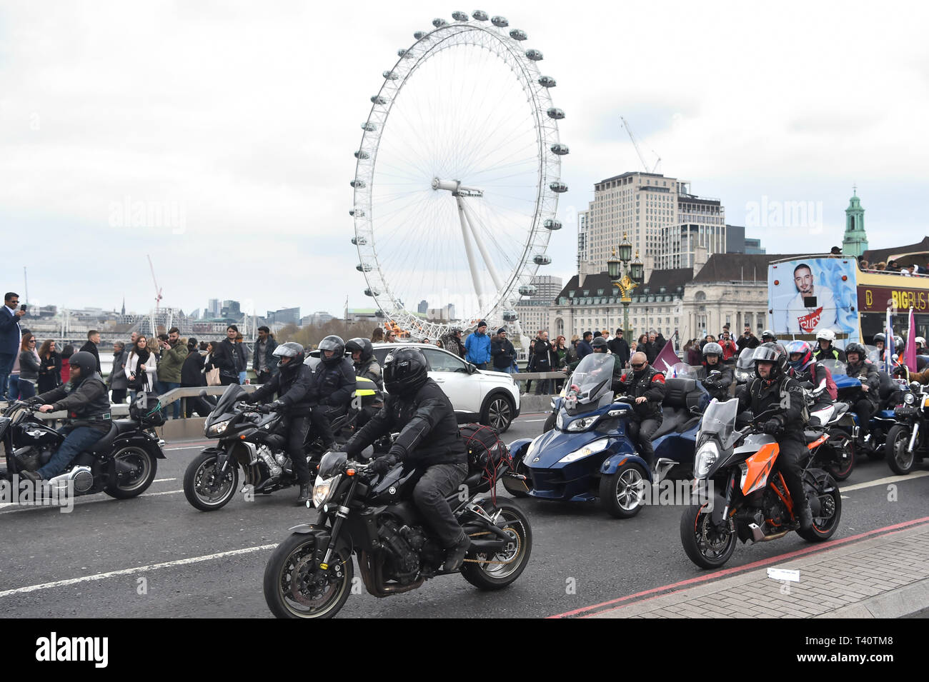 Motorcyclists take part in the Rolling Thunder ride protest cross Westminster Bridge in London, to support of Soldier F who is facing prosecution over Bloody Sunday. Stock Photo