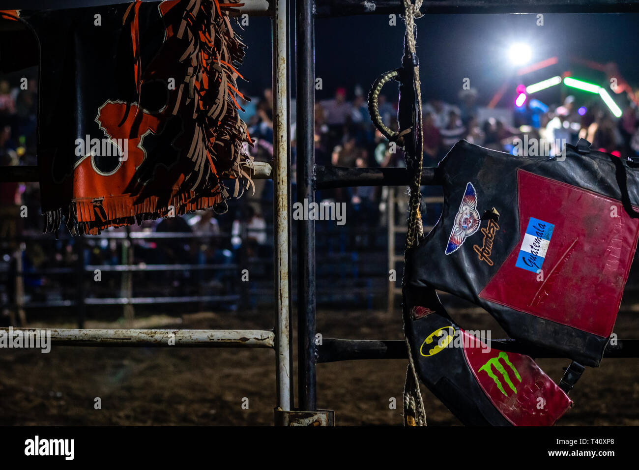 bull riding gear on gate in Guatemalan rodeo Stock Photo Alamy