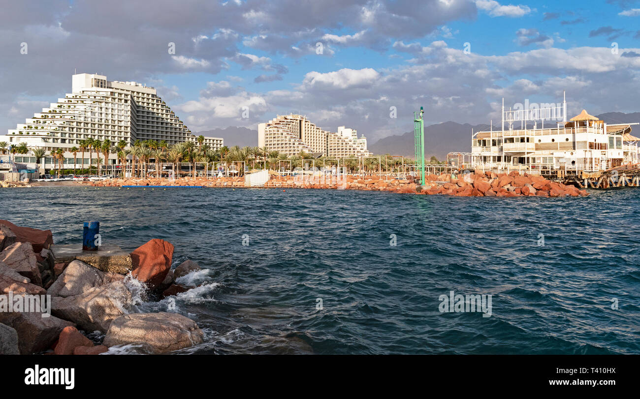 eilat resort on the gulf of eilat akaba in Israel showing the entrance to the man made lagoon with hotels in the background Stock Photo
