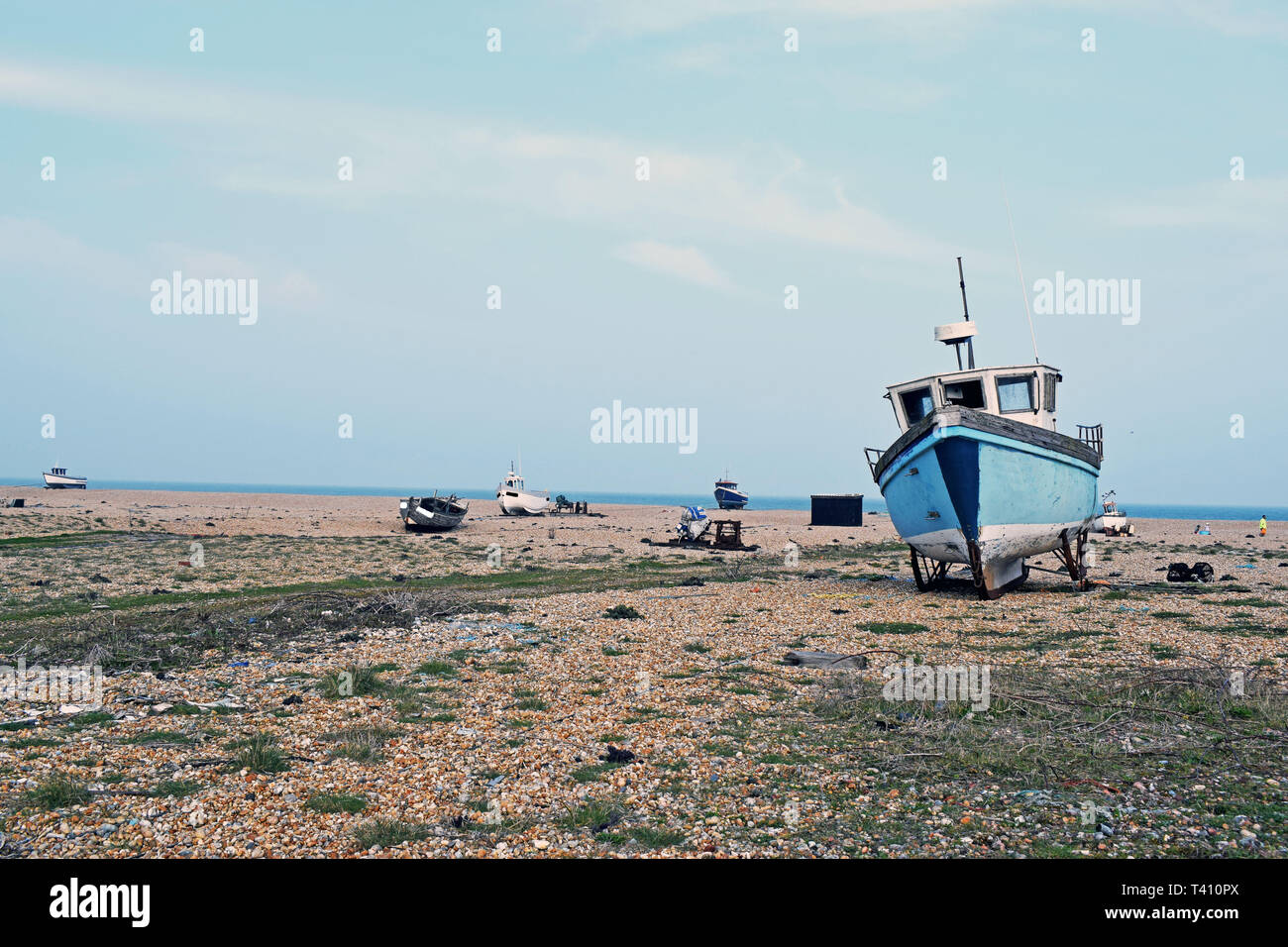 sea scene at Dungeness Kent, a fishing boat is moored on the pebble ...