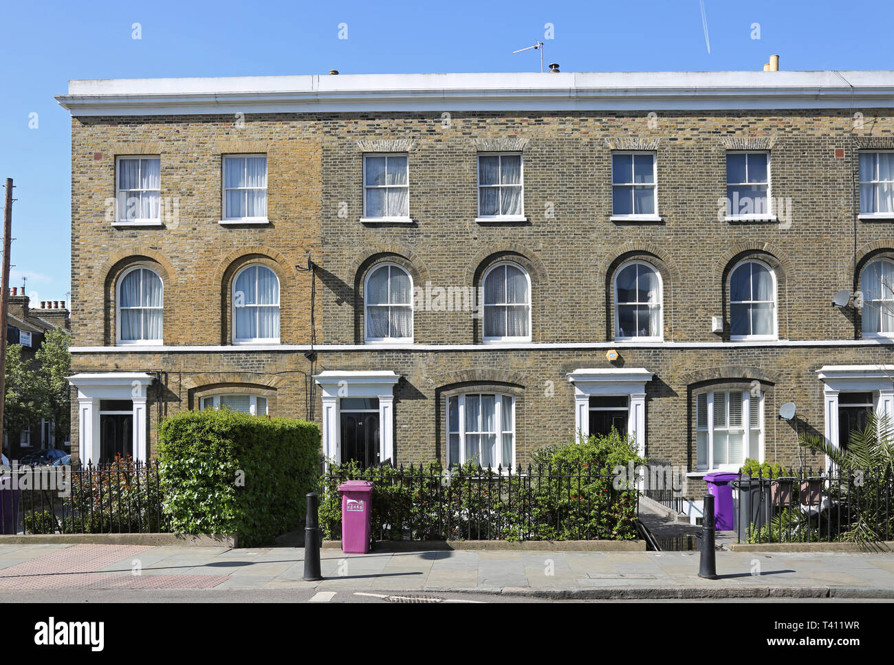 Elegant terrace of Georgian houses on Campbell Road, Bow, in London's East end. Traditionally a poor area, now highly desirable. Stock Photo