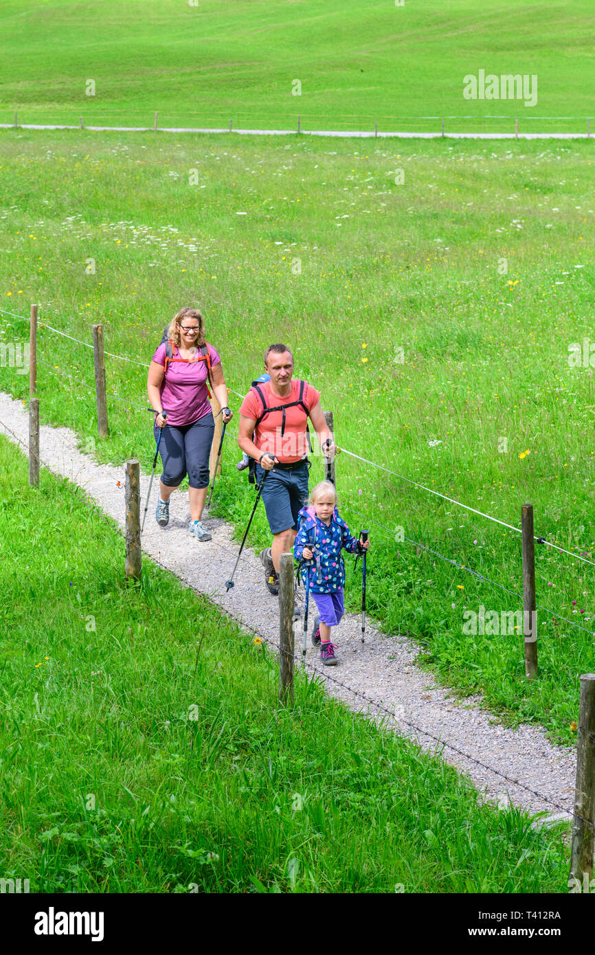 Family doing a hiking tour in summer holidays Stock Photo