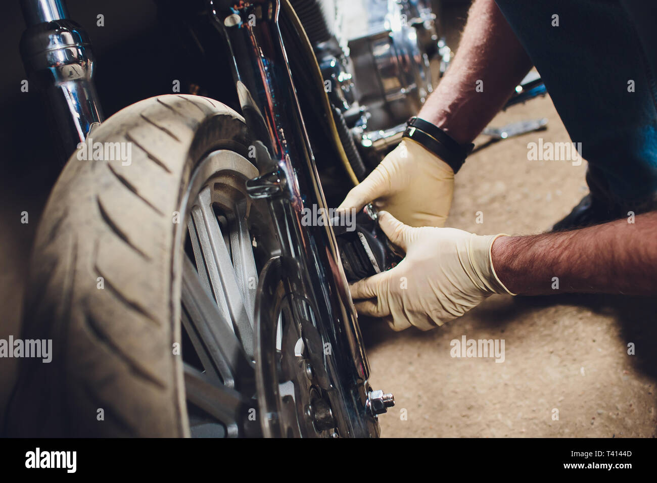 Man Fixing Bike Confident Young Man Repairing Motorcycle Near His