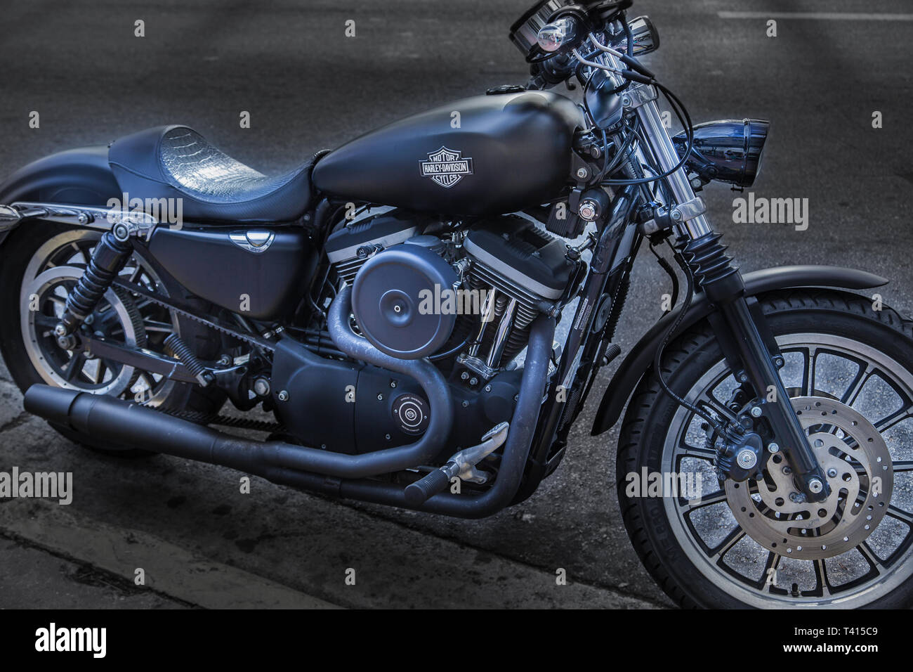 Miami, USA - April 09, 2014: A Harley Davidson on a street in Miami. Harley-Davidson Inc. is a stock-traded American company that has become internati Stock Photo