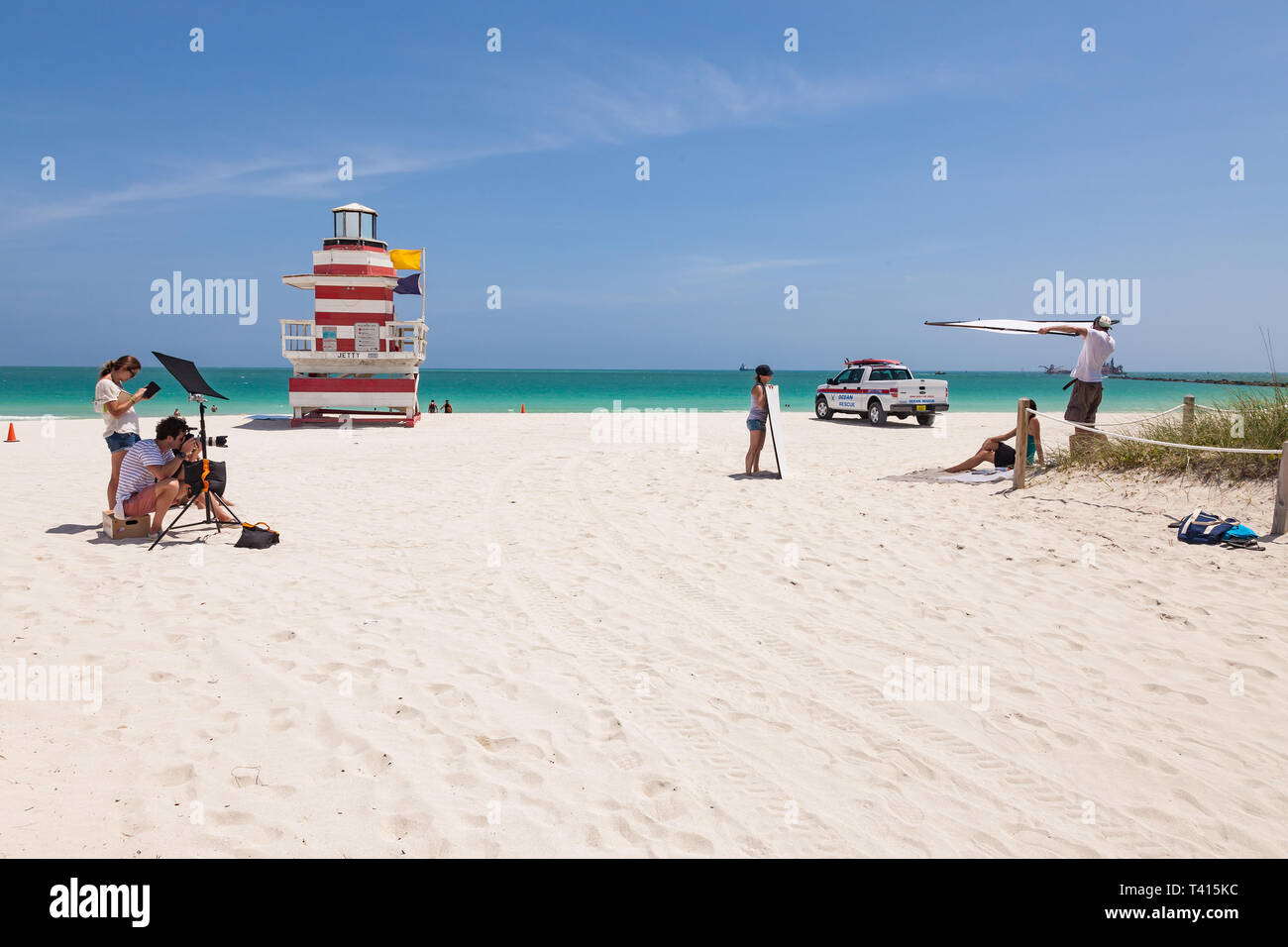 Miami, USA - April 8, 2013: Photographer and his assistant at photoshooting in South Beach-Miami Stock Photo