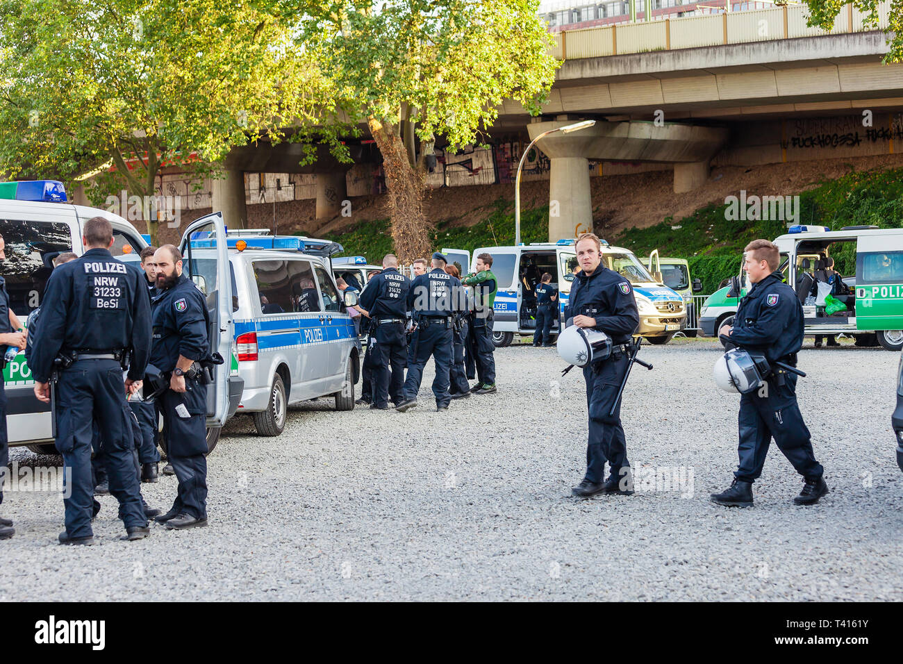 Cologne, Germany - September 24, 2016: Policemen and policewomen in an action in front of the Cologne exhibition grounds. Stock Photo
