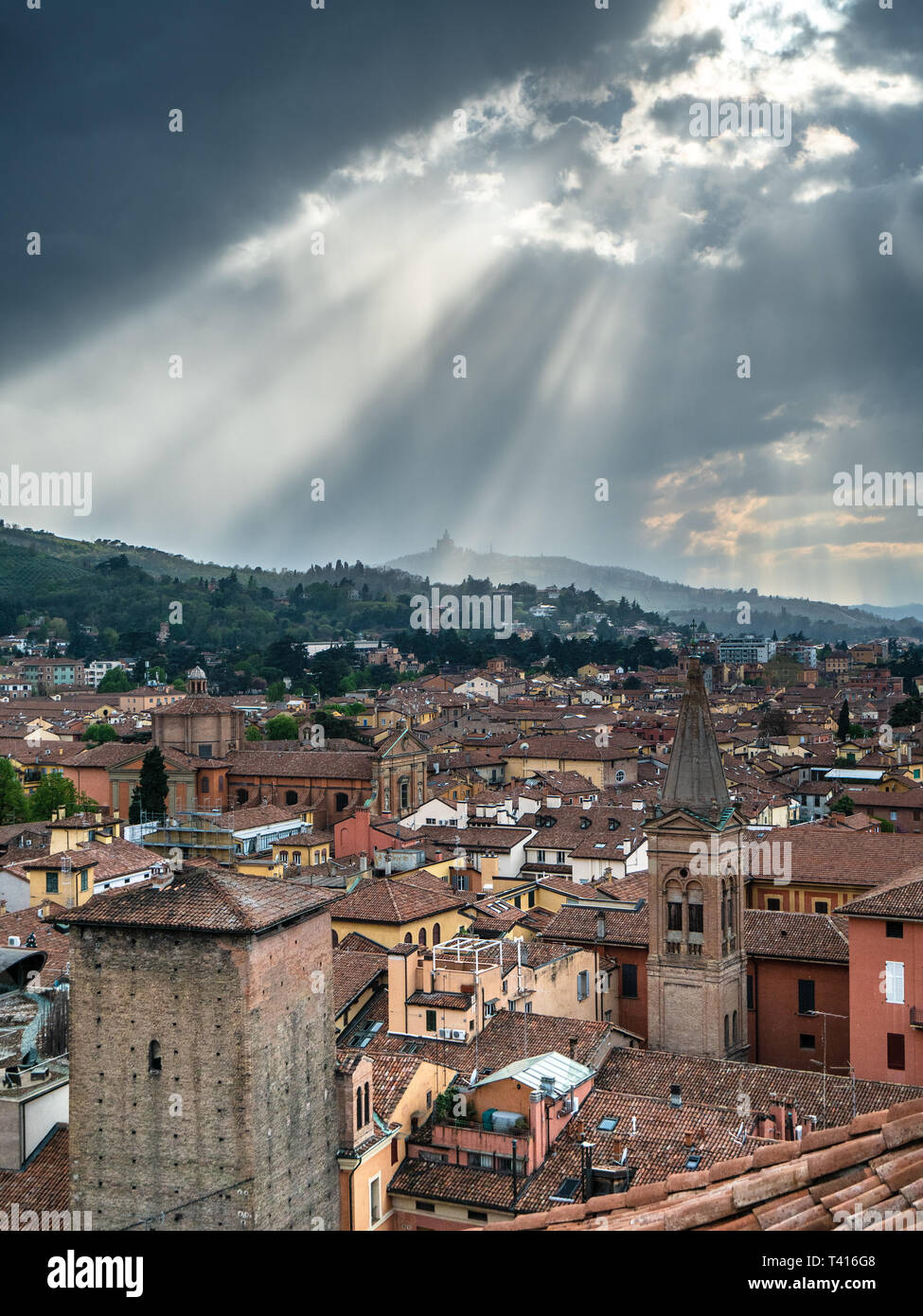 Bologna Skyline - view over the Bologna Rooftops in central Bologna Italy towards the Sanctuary of the Madonna of San Luca, Sanctuary of San Luca Stock Photo