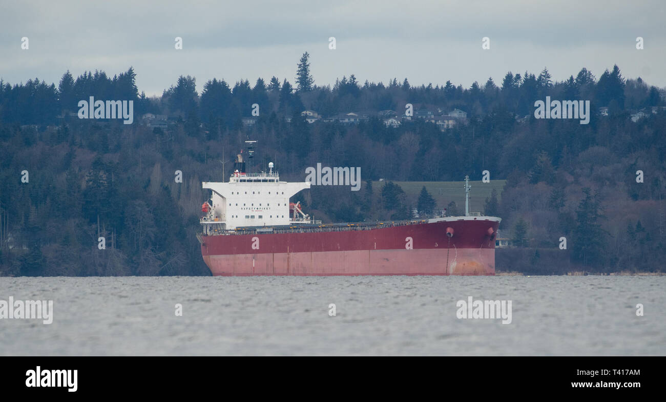 Cargo ship near the coast, British Columbia, Canada Stock Photo