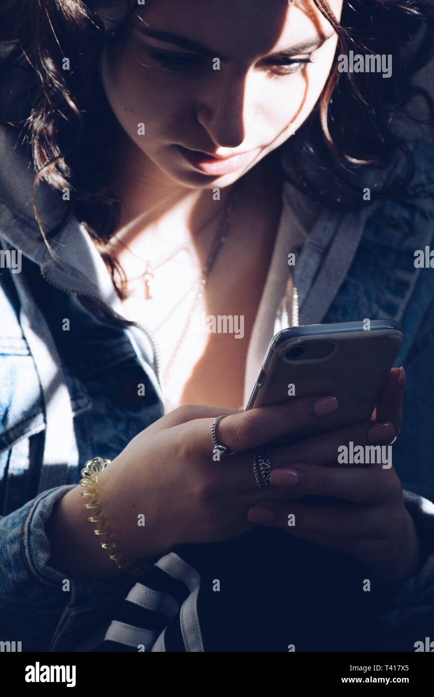 Mobile phone children using hi-res stock photography and images - Alamy