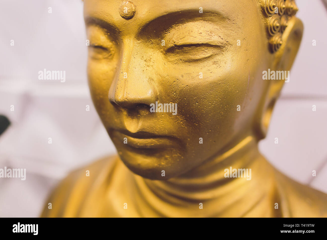 Golden buddha statue isolated on white background Stock Photo - Alamy