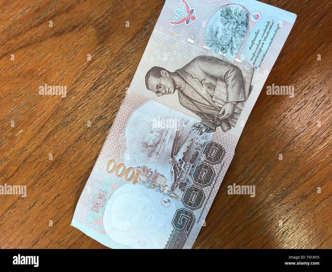 King Bhumibol Adulyadej on a 1000 bat banknote of Thailand Stock Photo ...