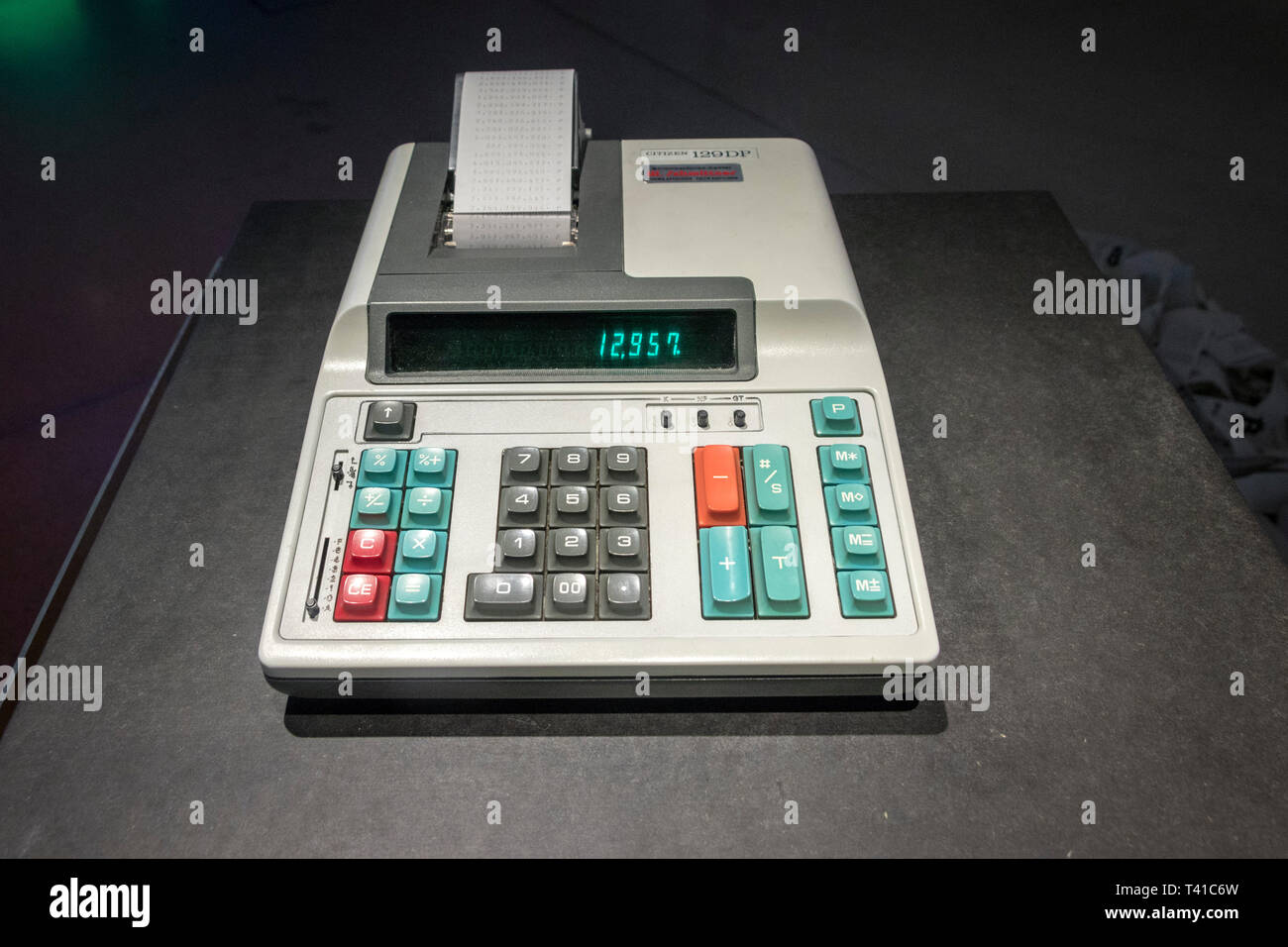 classic vintage calculator with paper roll Stock Photo
