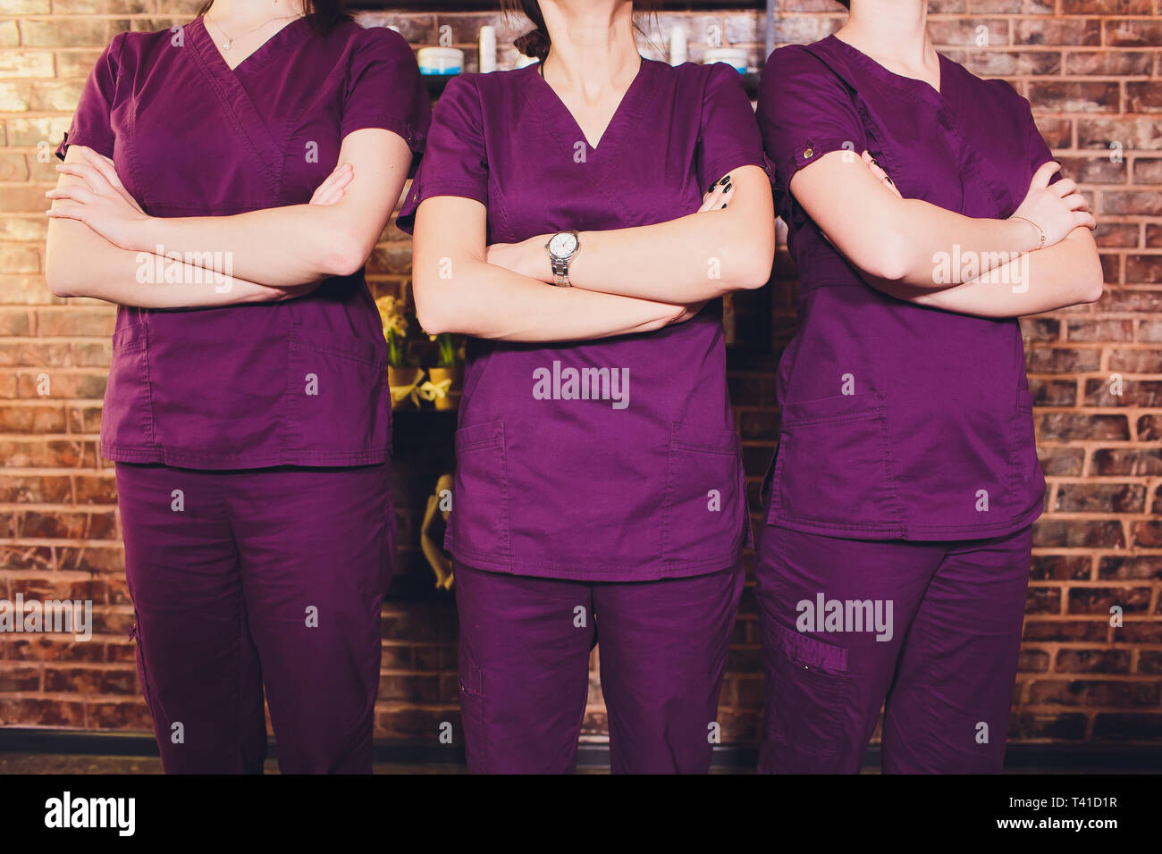 Portrait of female cosmetologist in uniform in the cosmetology