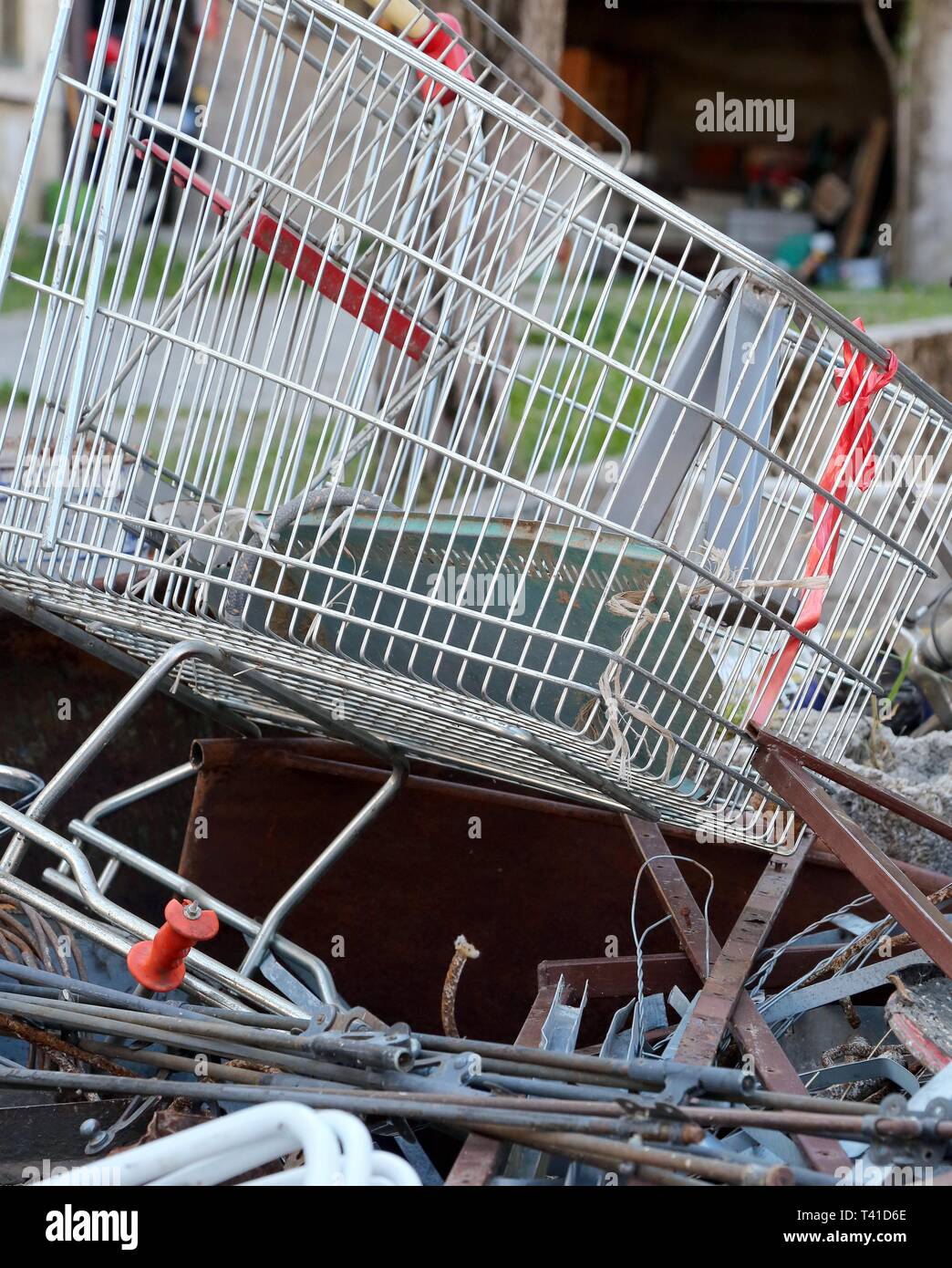 old broken shopping cart in recycling ecocenter Stock Photo Alamy