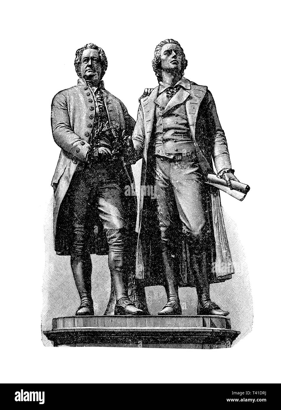 Statues of Johann Wolfgang Goethe and Friedrich Schiller, the prominent German writers, incorporated in a bronze monument by Ernst Rietschel (1857) in Weimar Germany in front of the Court Theater Stock Photo