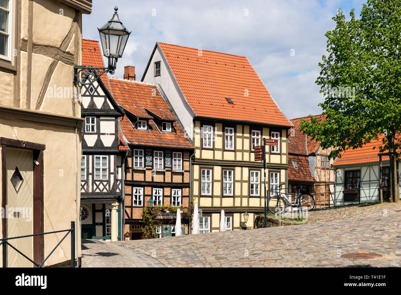 QUEDLINBURG, GERMANY - APR 26, 2018: Historic timber frame houses in the medieval town Quedlinburg, North of the Harz mountains. Saxony-Anhalt, German Stock Photo