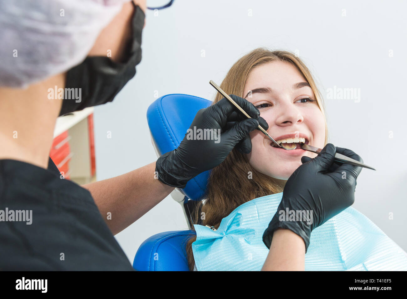 Dental clinic. Reception, examination of the patient. Teeth care. Young