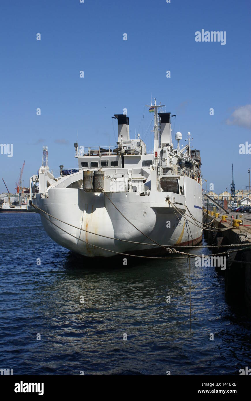 Cable boat, tugs and floating crane in Victoria Basin. Cape Town. SA. Stock Photo