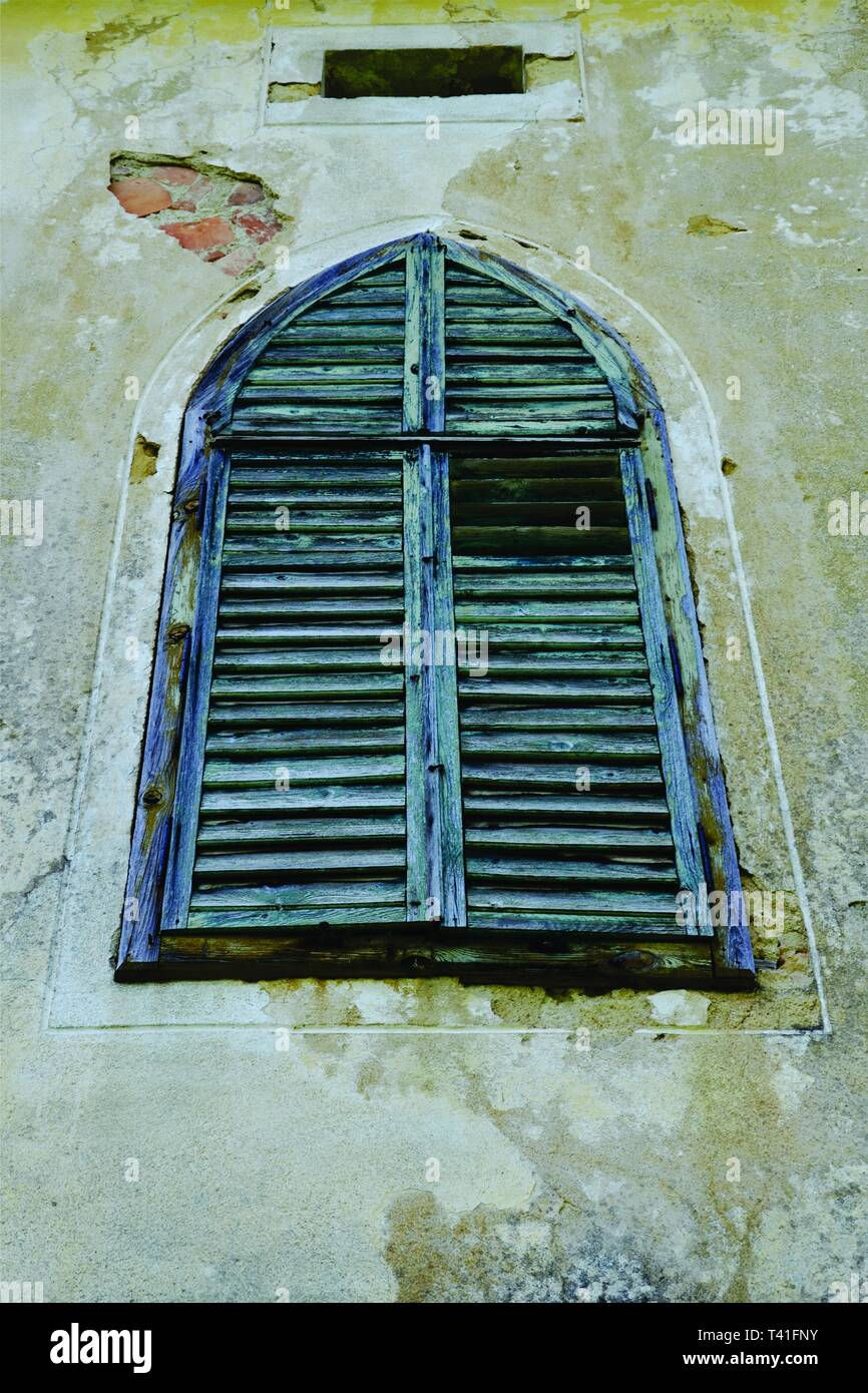 Old wooden mansion window shutter hires stock photography and images