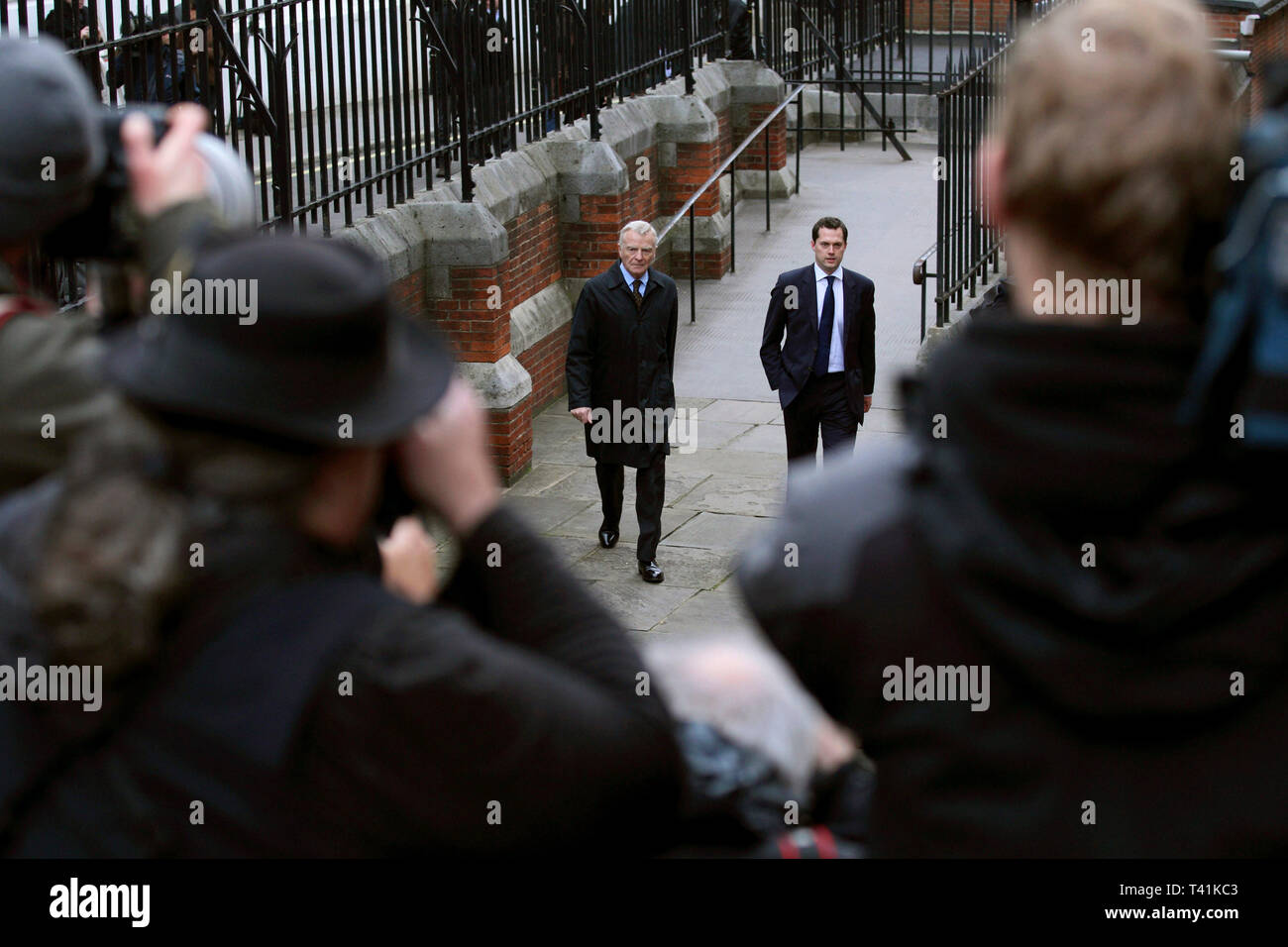Press photographers photograph Max Mosley from their press area at the Leveson Inquiry. High Court, London. 21 November 2011. Stock Photo