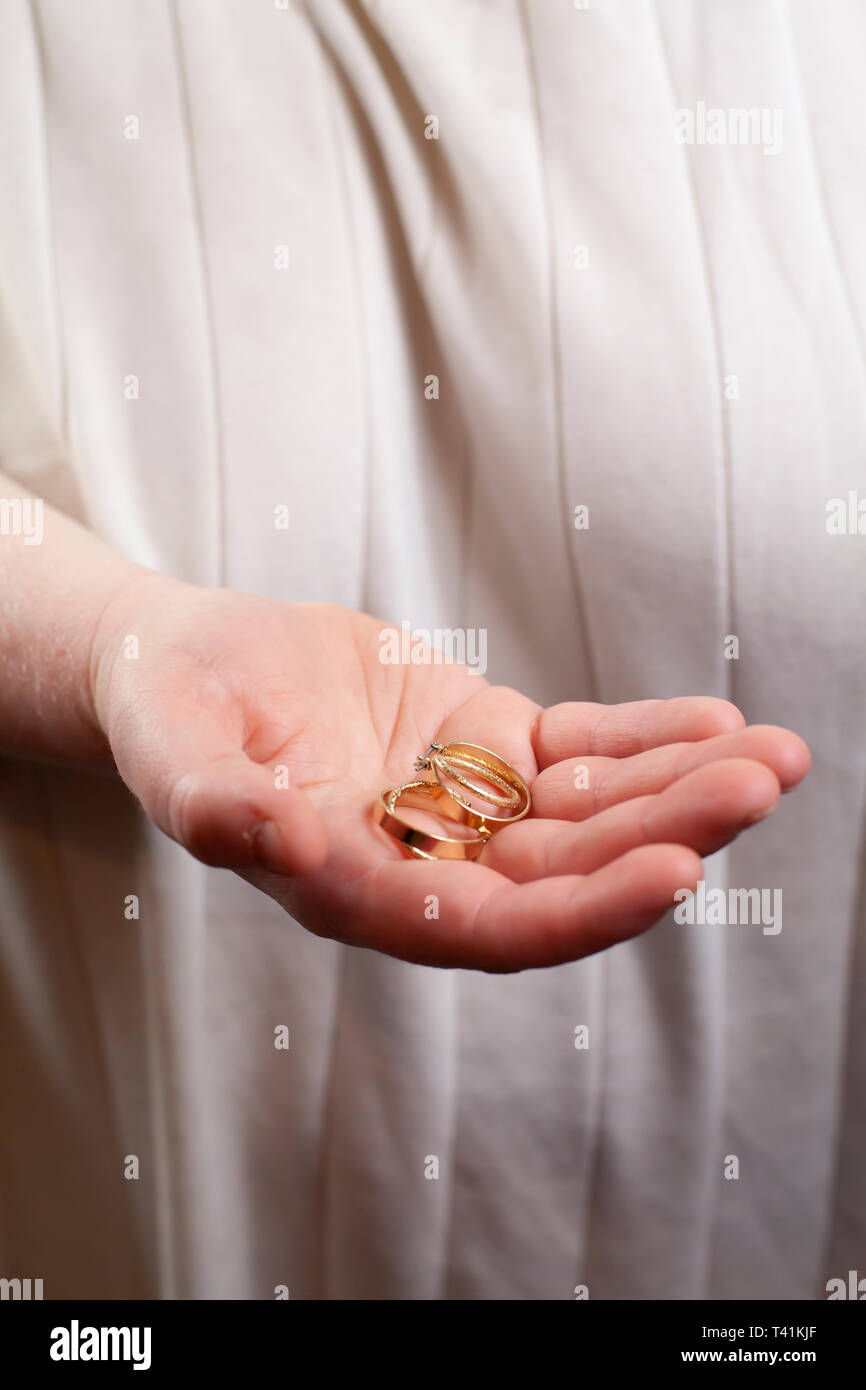 Woman With Gold Earrings High Resolution Stock Photography and Images ...