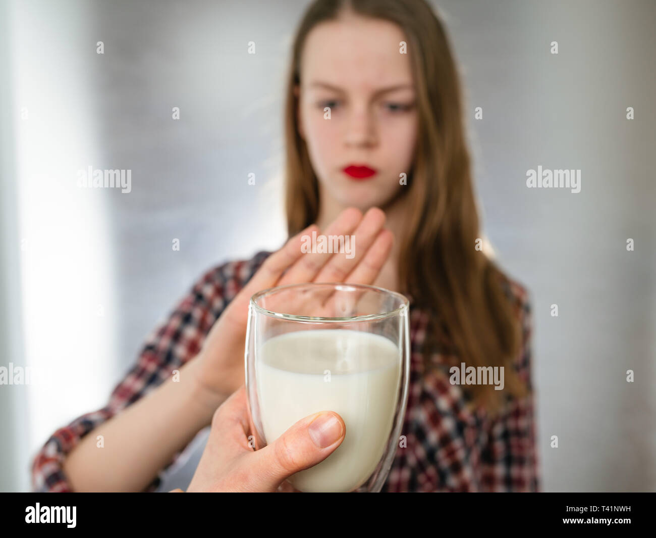 Girl with milk allergy lactose intolerance concept Stock Photo Alamy