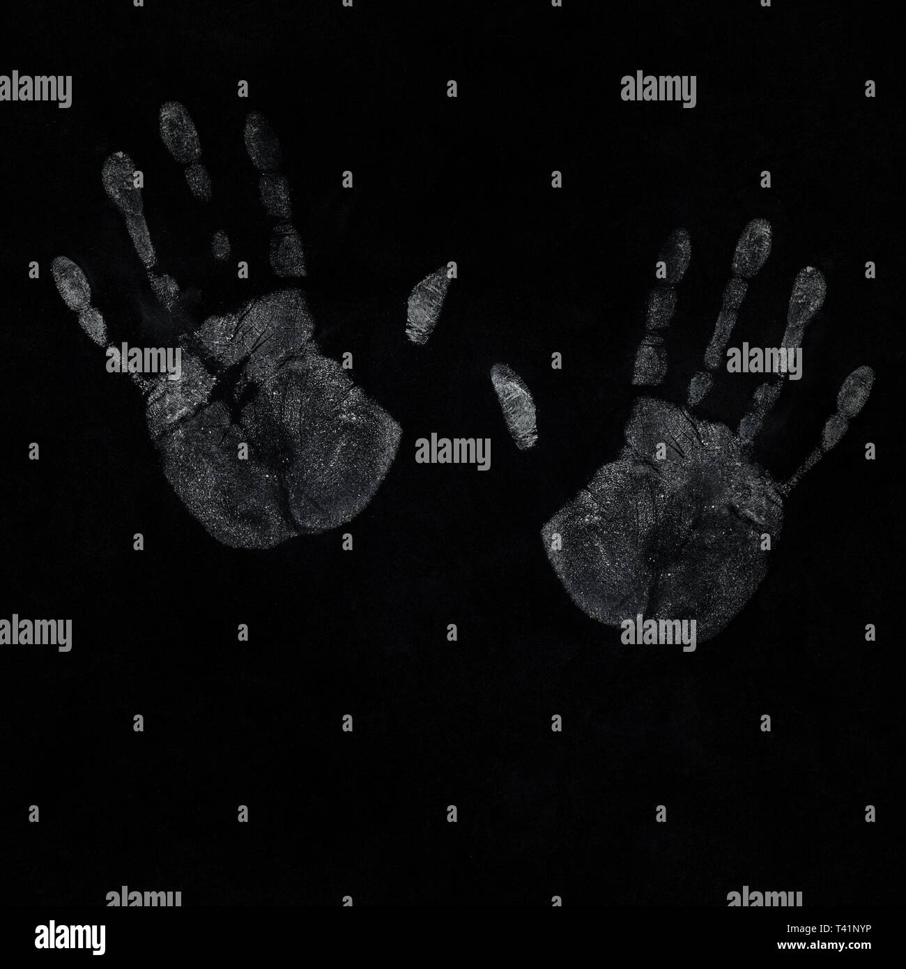 seamless real dirt hand print on black background Stock Photo