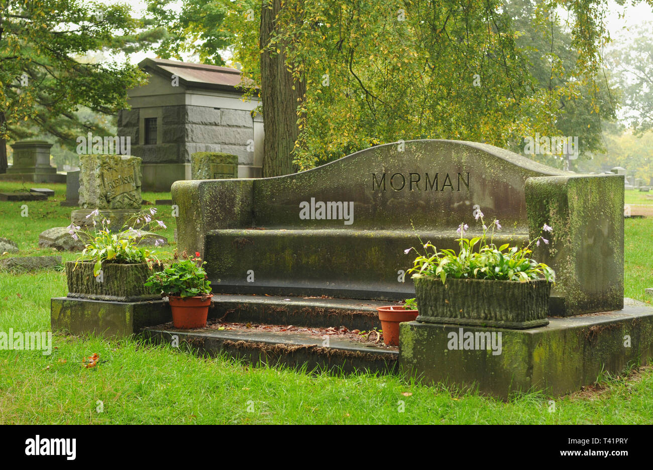 A unique bench-type monument marks the Morman grave at the historic Oakhill Cemetery in Grand Rapids, Michigan. Stock Photo