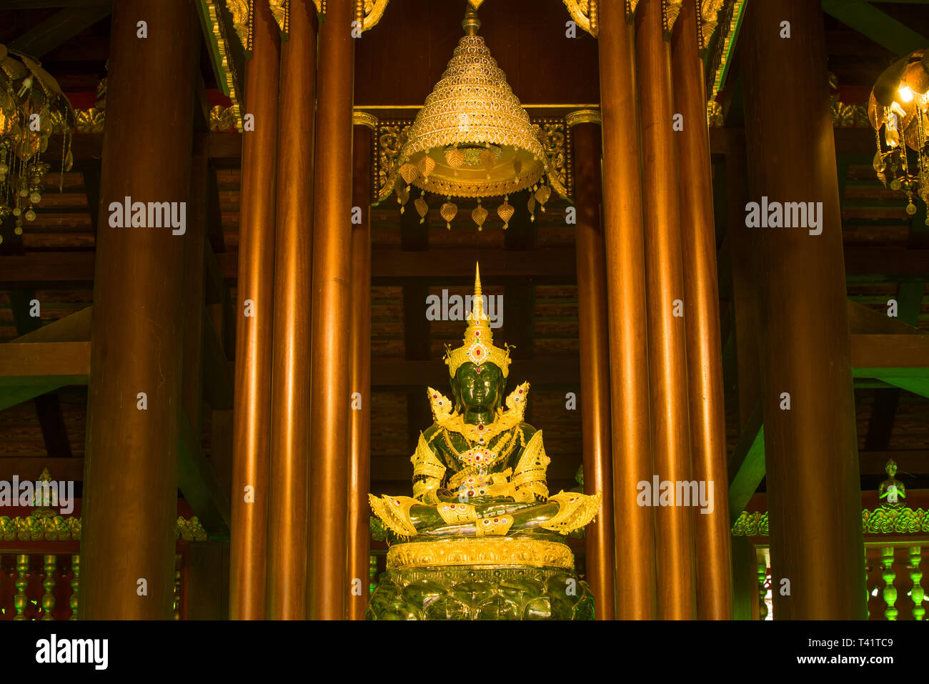 CHIANG RAI, THAILAND - DECEMBER 16, 2018: A copy of an ancient statue of the Emerald Buddha in a Buddhist temple Wat Phra Kaew Stock Photo