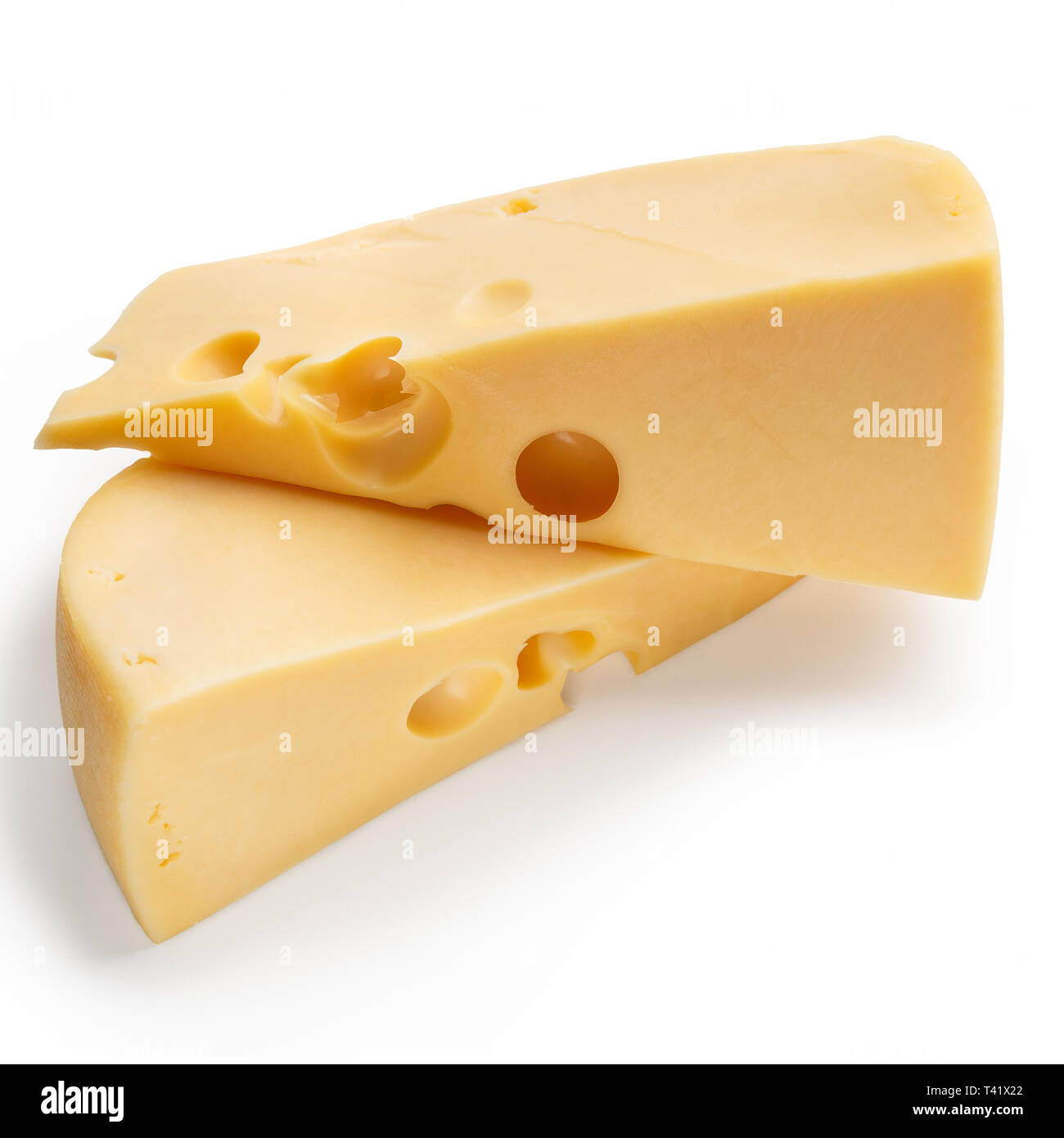 Cheese chunks on white Stock Photo Alamy