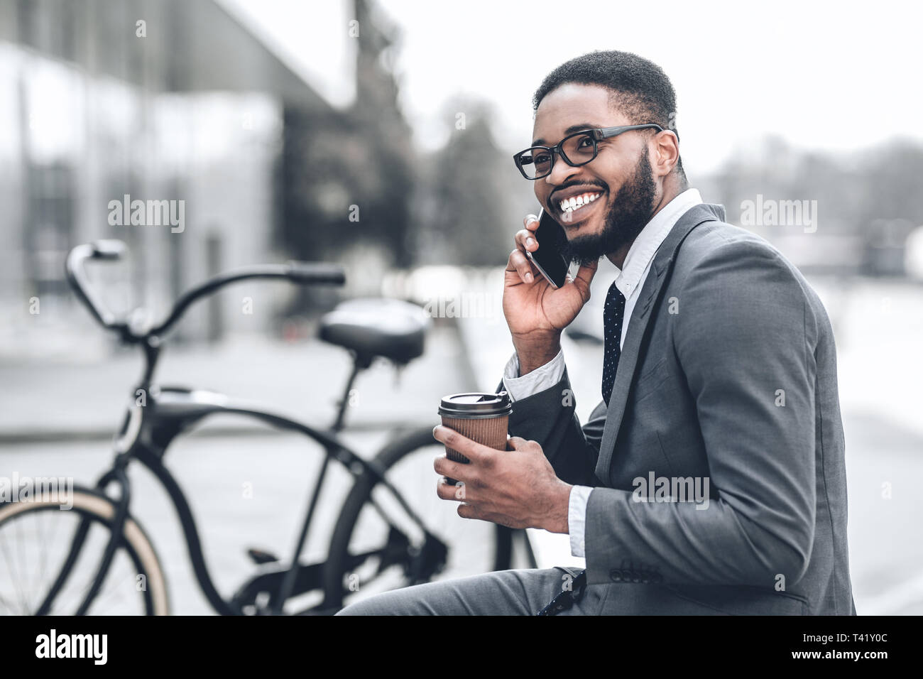 No time for break. Millennial businessman talking on phone Stock Photo