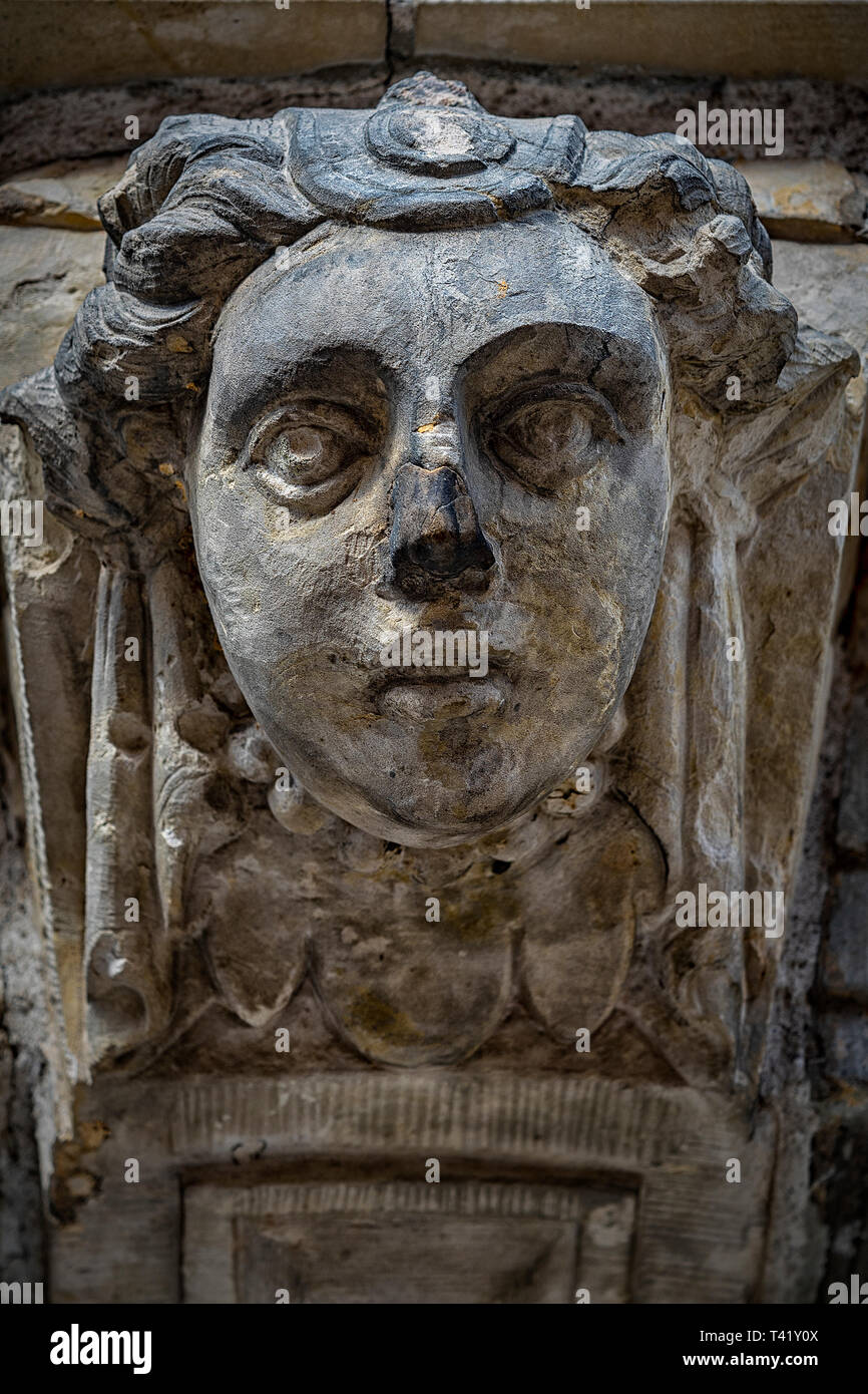 Female head carved in stone hi-res stock photography and images - Alamy