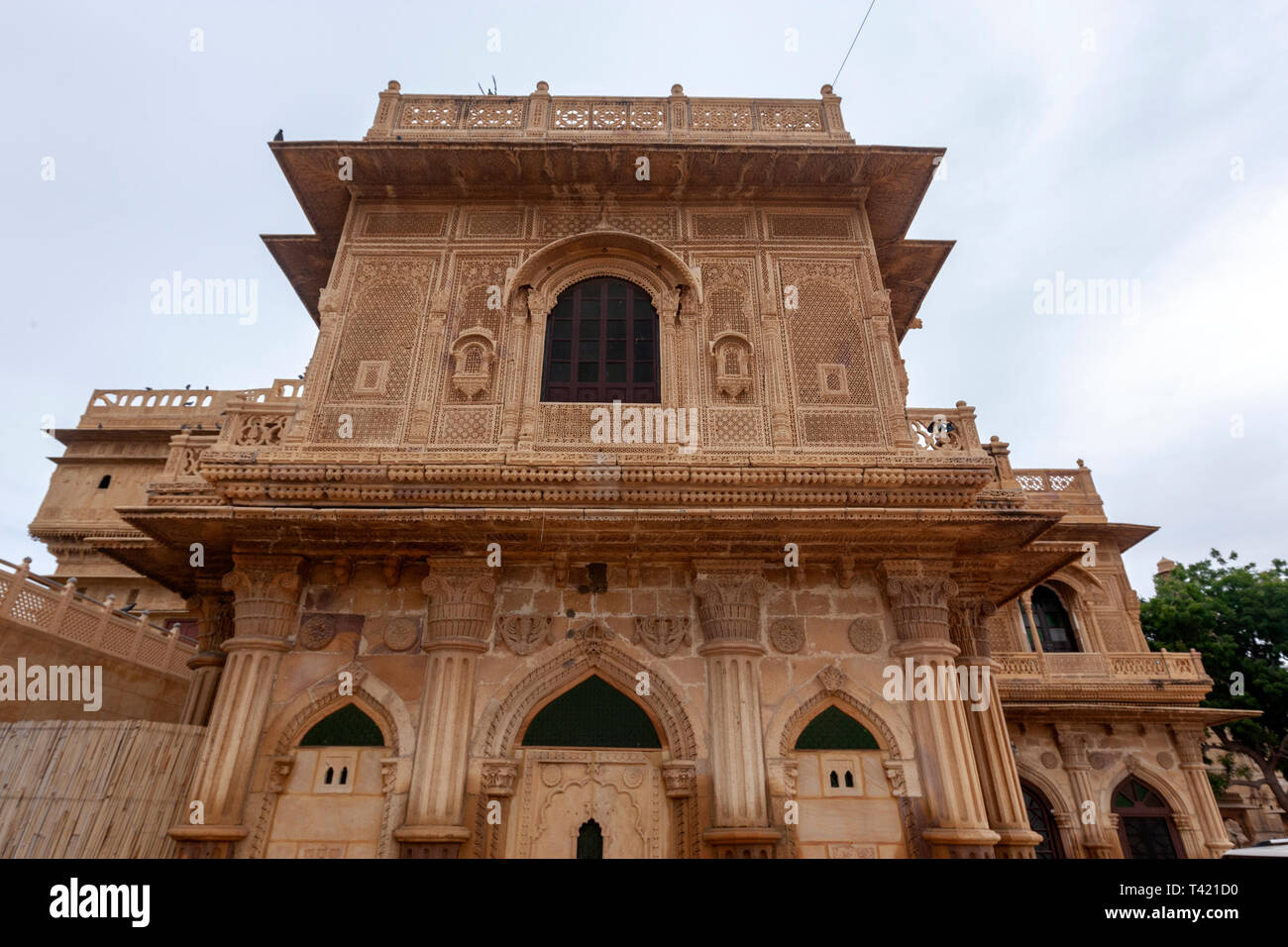 Jharokha (or jharoka) is a type of overhanging enclosed balcony in a Haveli , Jaisalmer, Rajasthan, India Stock Photo